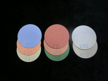 A polyurethane polishing pad for optics